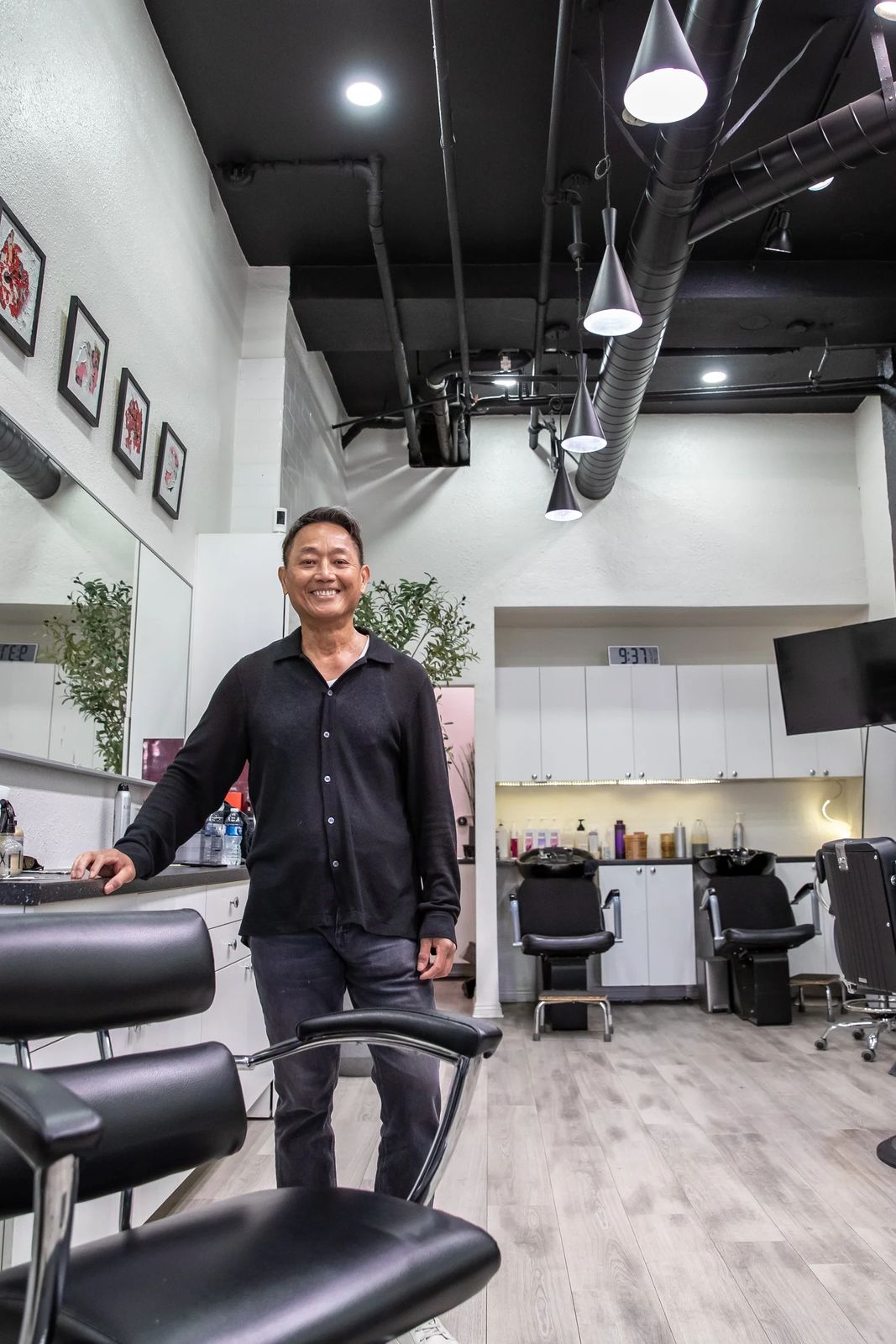 Sana Lim standing in his modern Pasadena salon